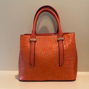 Vibrant Orange Crossbody Bag with Textured Leather and Structured Shape